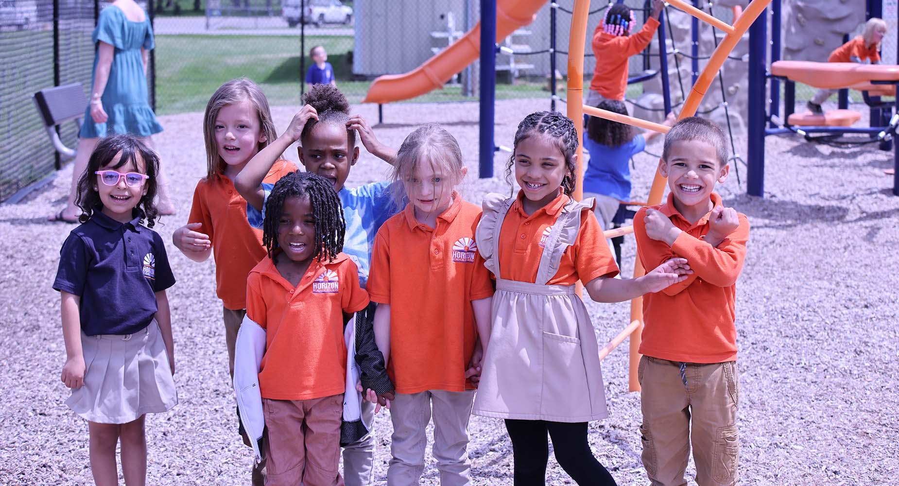 Teacher helping student