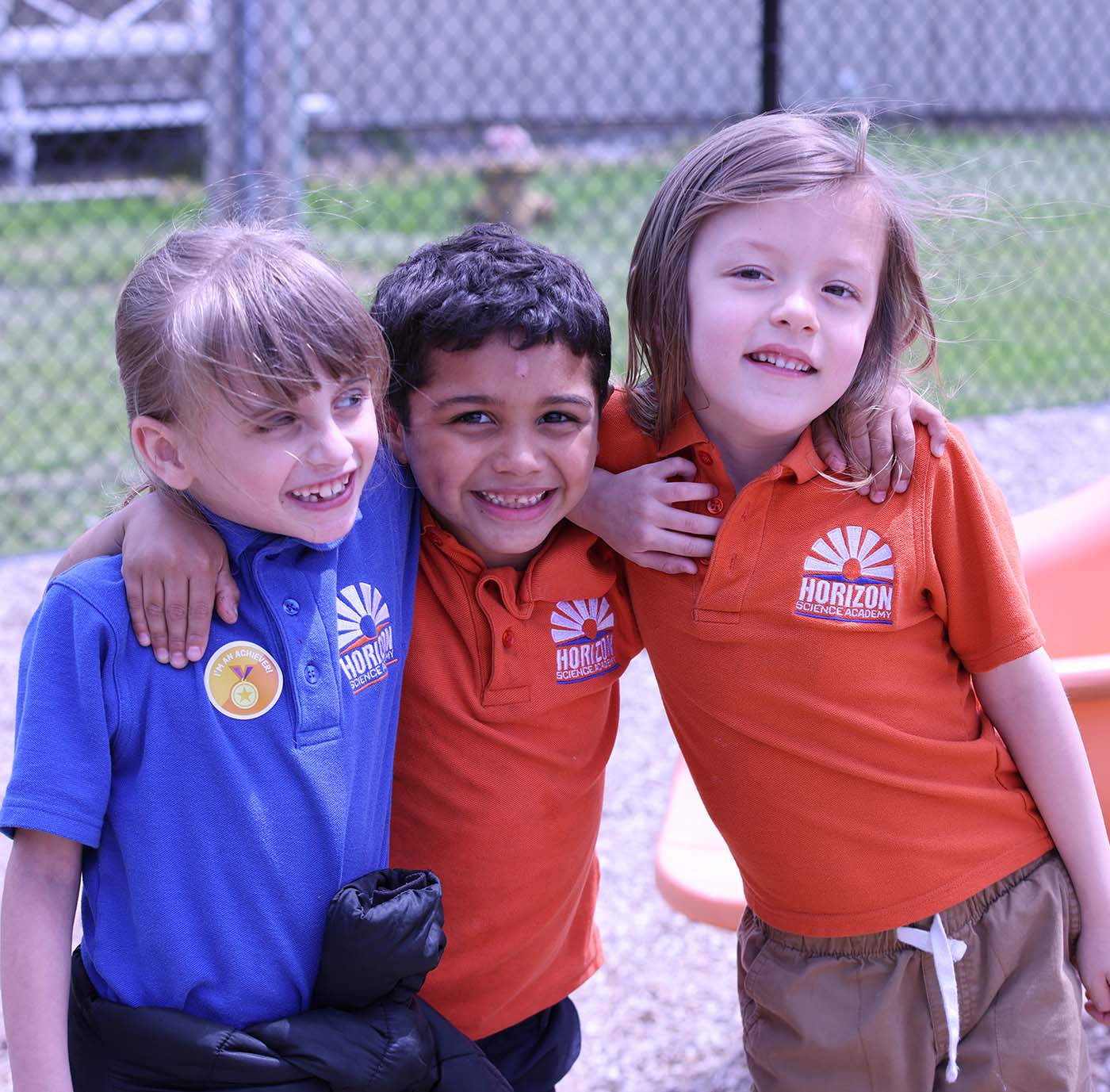 HSA Lorain South student drawing at a desk in a classroom setting
